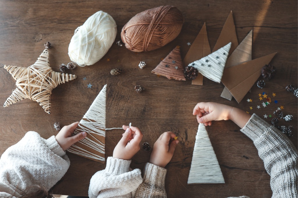 Children making handmade Christmas ornaments - Brown Lawyers